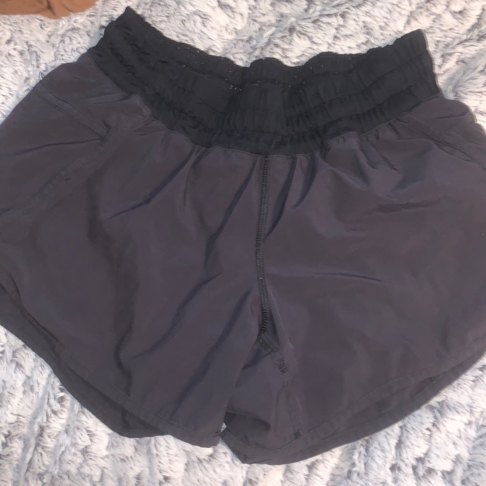 Lululemon high waisted tracker short. Size 6. Slightly worn but good condition.